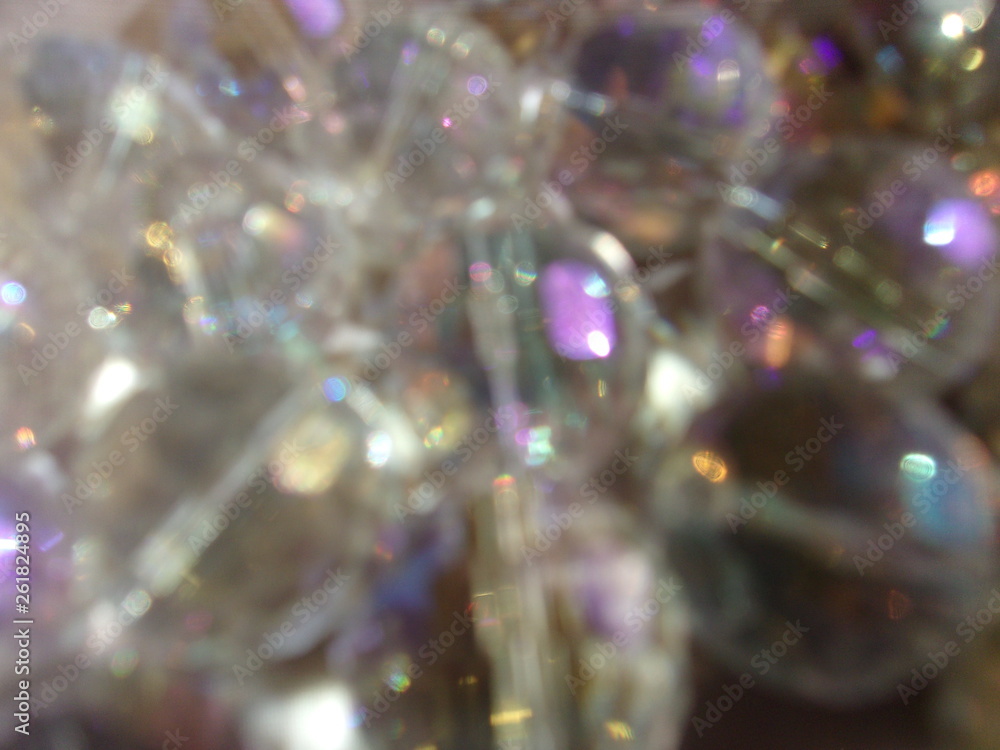 blurred sparkling background. crystal ball. round glass beads. play of light blurred sparkling background. crystal ball. round glass beads. play of light