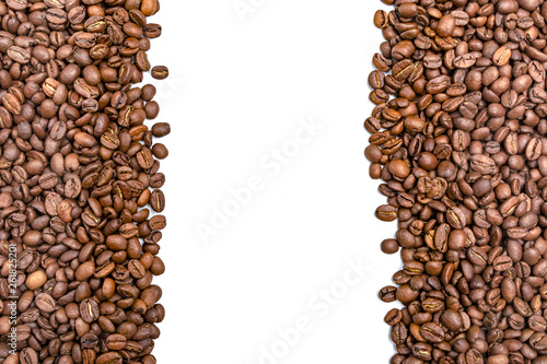Vertical frame of roasted coffee beans isolated on white may use as background or texture. Copy space for text.