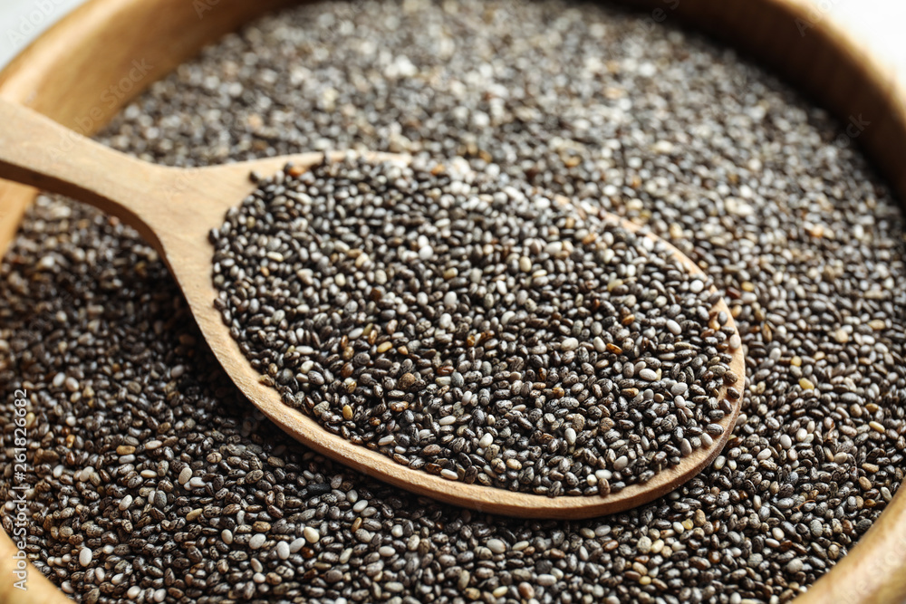 Closeup of bowl and spoon with chia seeds Closeup of bowl and spoon with chia seeds