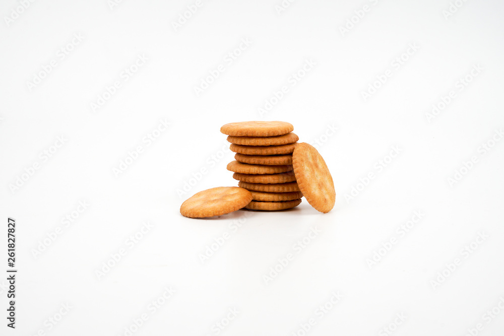 Stack of salted biscuits isolated on white background. Stack of salted biscuits isolated on white background.