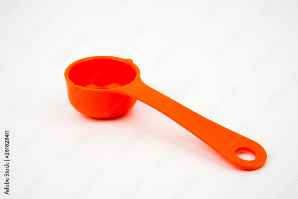 1/8 cup equals to 30 ml measuring cup isolated on white background 1/8 cup equals to 30 ml measuring cup isolated on white background