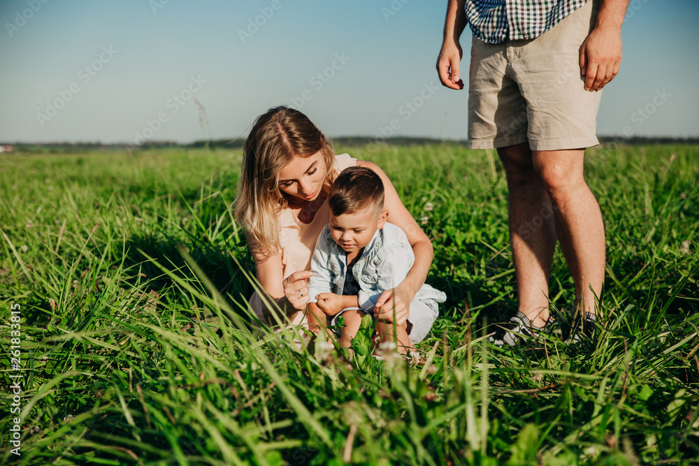 Fototapeta premium Happy family enjoying together in summer day.