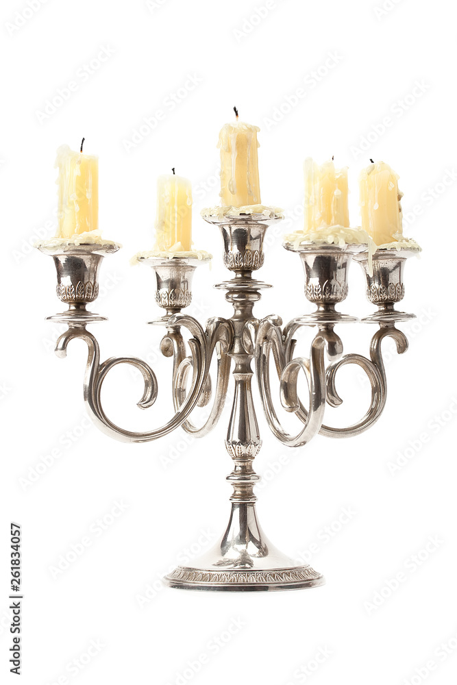 Old candlestick with candles .