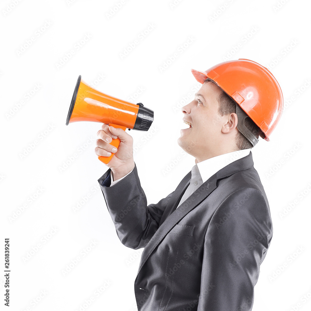 young engineer with a megaphone.isolated on white young engineer with a megaphone.isolated on white