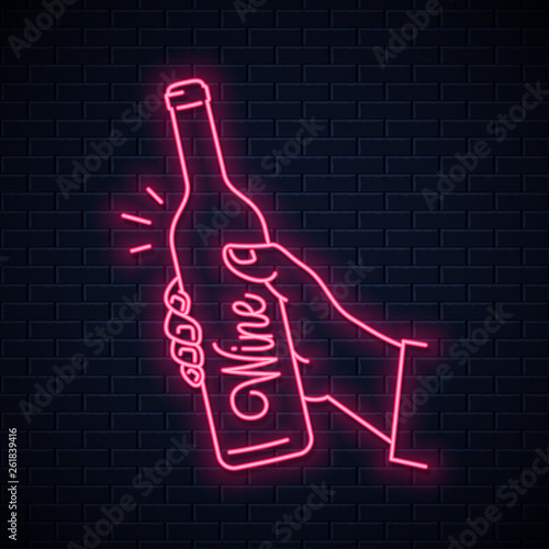 Hand hold wine bottle neon sign. Male hand holding