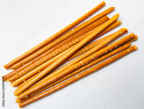 salty sticks on white background