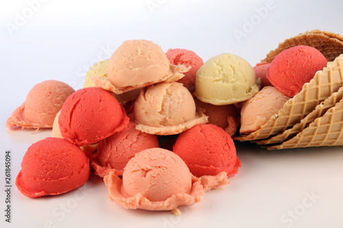 Set of ice cream scoops of different colors and flavours in the summer