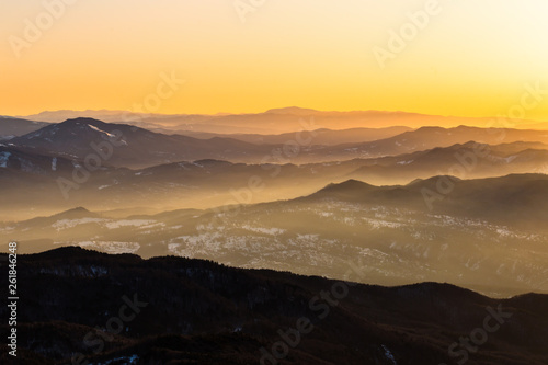 Carpathians mountains range covered by sunrise sun