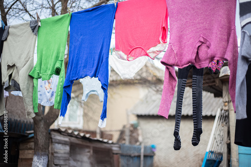 Colorful clothes drying outside © Lalandrew