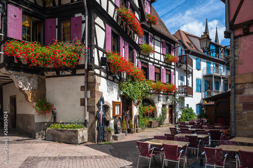 Oberai, France - August 11, 2014: Beautiful half-timbered houses in the historic center of Obernai in Alsace. Obernai is one of the most beautiful town on the wine route in Alsace, France