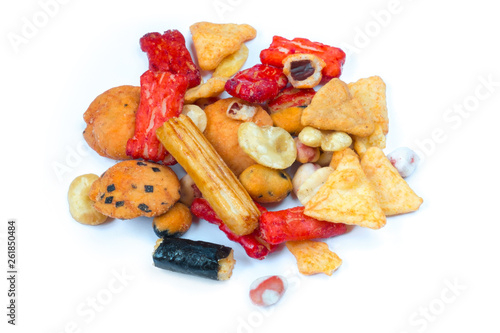 Popular Traditional Japanese snacks -  nori maki, Japanese, rice cracker, glaze peanuts and crackers. Isolated on white. Close up.
