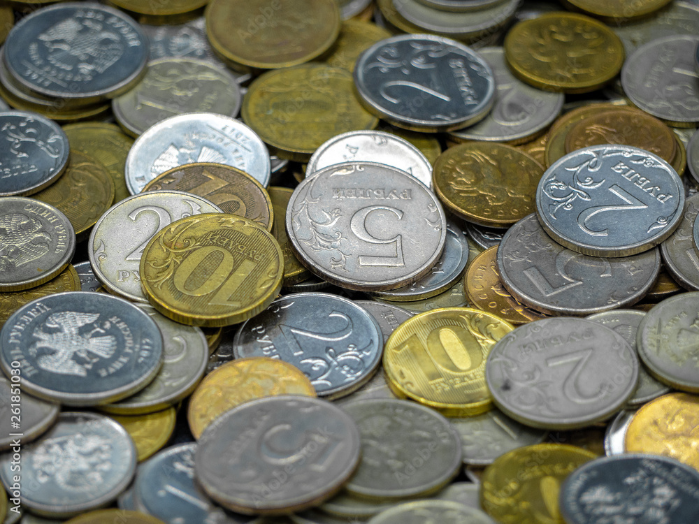 Russian coins texture. Many coins of various denominations: rubles and kopecks. Perspective view. Russian coins texture. Many coins of various denominations: rubles and kopecks. Perspective view.