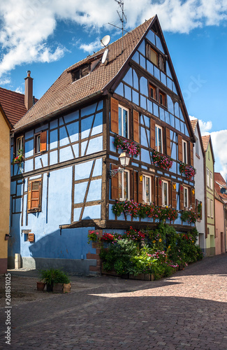 Beautiful half-timbered houses with red tiled roofs in the historic center of Selestat in Alsace.