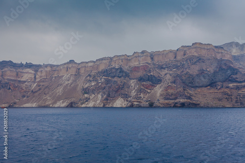 Panorama of the colorful cliff of the caldera in the island of Santorini, Greece
