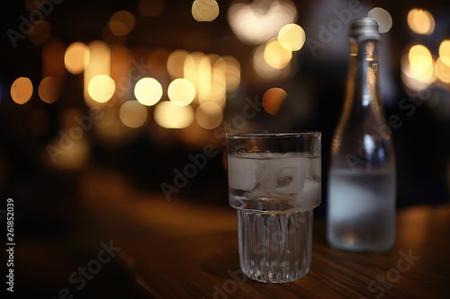 Wallpaper Mural glass of water with ice in the restaurant / cold clear clear water in a glass with ice pieces Torontodigital.ca