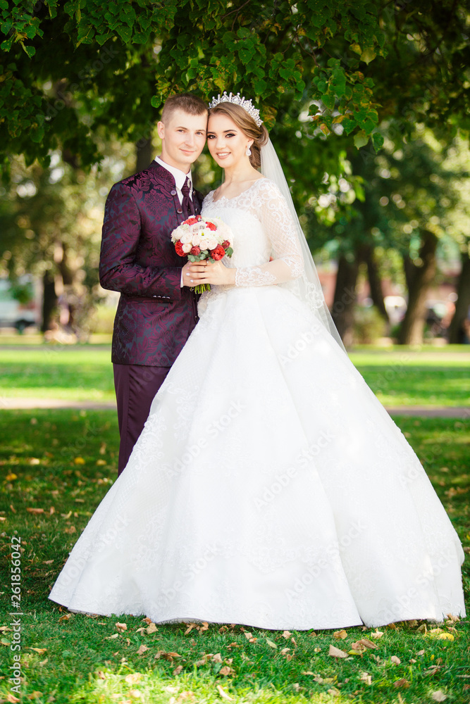 Wedding. Bride and groom walk outdoors Wedding. Bride and groom walk outdoors