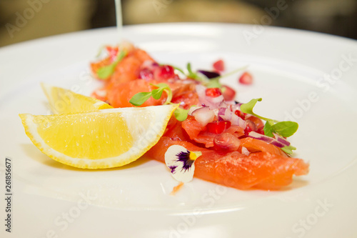 Salmon with pomegranates and onion appetizer