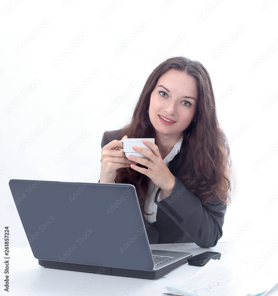 modern business woman with Cup of coffee in the workplace. modern business woman with Cup of coffee in the workplace.
