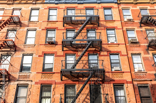 Facade in NYC USA with fire ladders