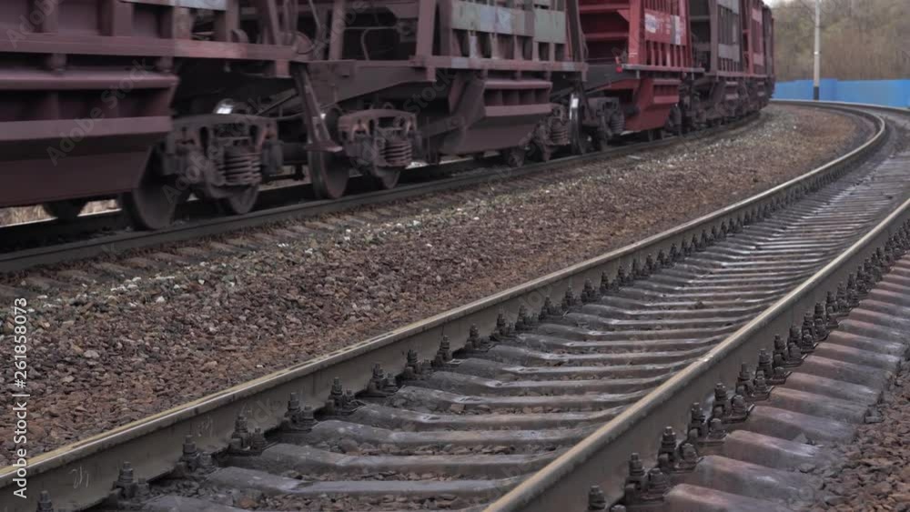 Wheels of a train on rails. Railway. The concept of logistics of transportation of goods by rail, freight train on the rails. Wheels of a train on rails. Railway. The concept of logistics of transportation of goods by rail, freight train on the rails.