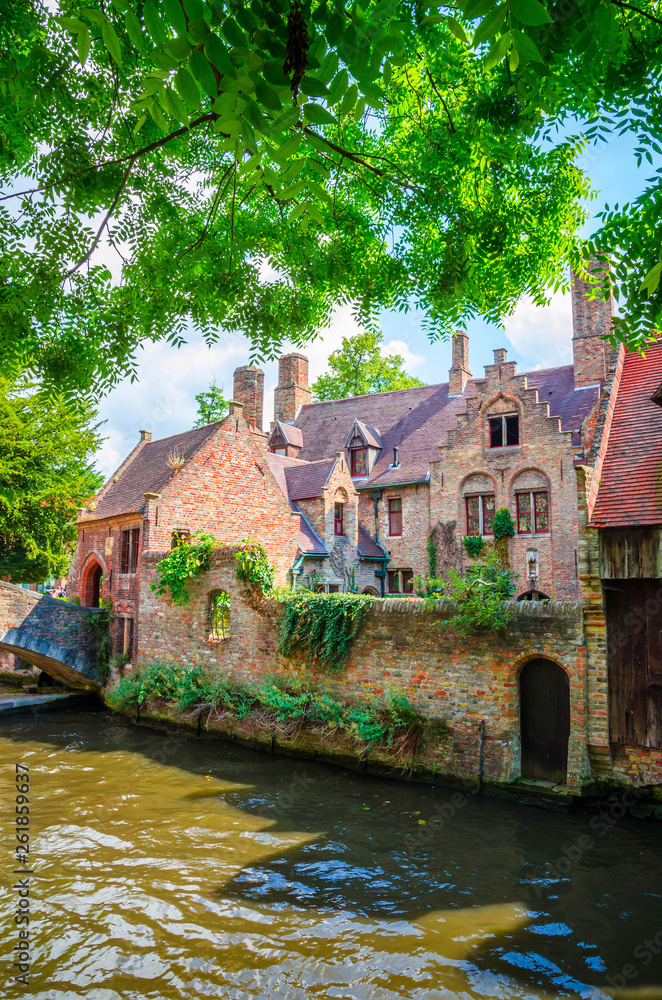 Fototapeta premium Beautiful canal and traditional houses in the old town of Bruges (Brugge), Belgium