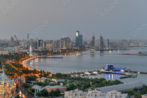 Panoramic skyline of the city of Baku, Azerbaijan at dusk.