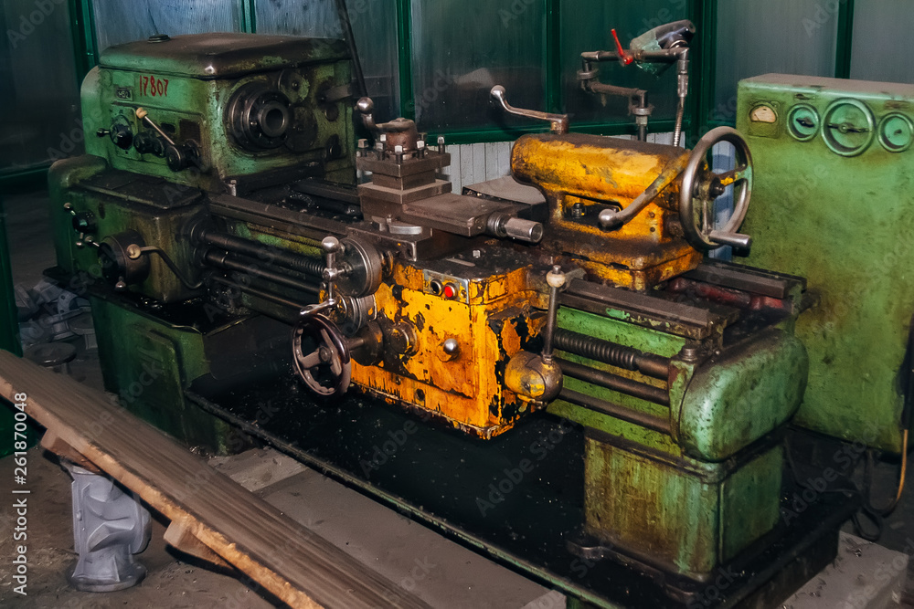 Old lathe in metalworking factory Old lathe in metalworking factory