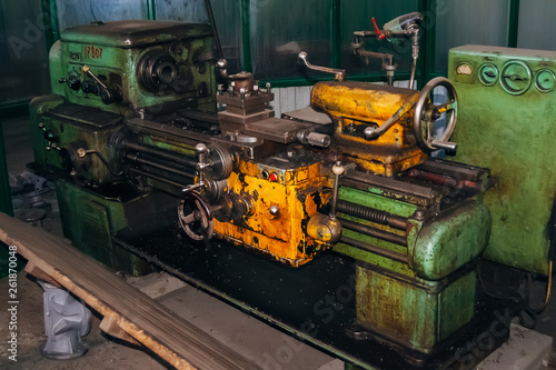 Old lathe in metalworking factory 