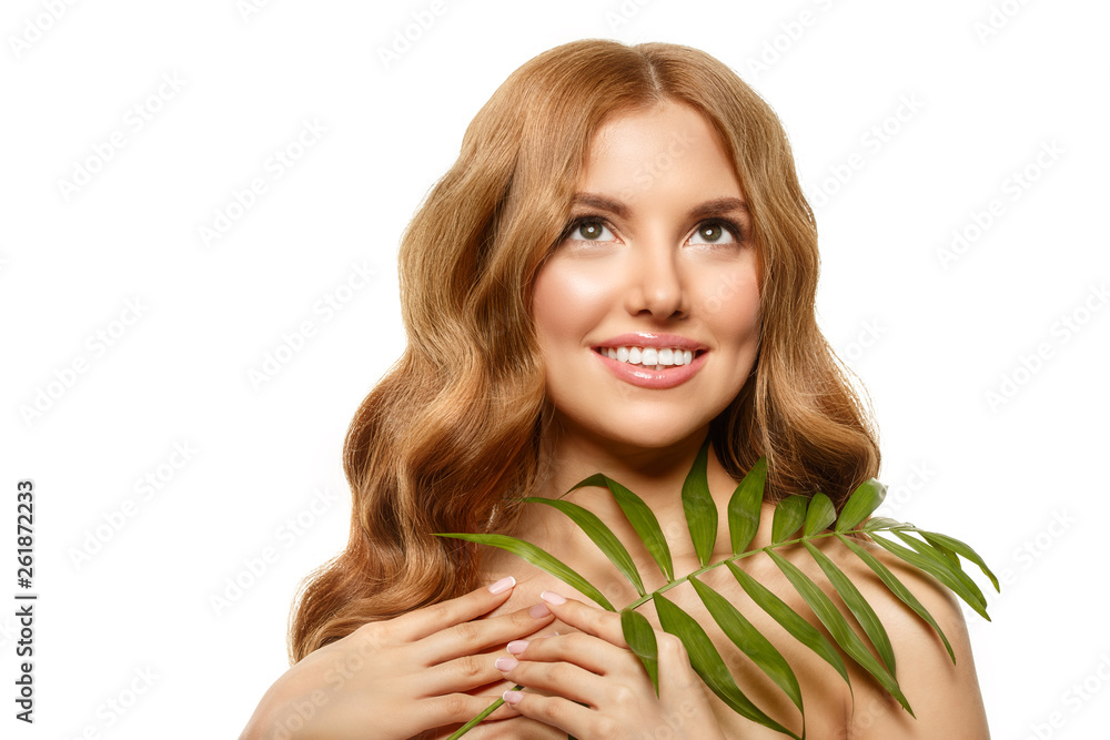Naklejka premium Spa girl. beauty Young Woman with Clean Fresh Skin with tropical leaves. Facial treatment. Model with Expressive facial expressions. Cosmetology.