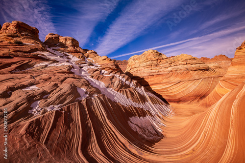 The Wave from Coyote Buttes Utah with rare snow covered features. This amazing geological desert formation was shot in winter during sunrise near the Arizona border. photo