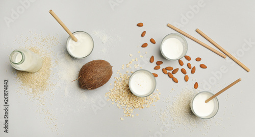 Assortment of organic vegan non-dairy plant-based milk in glasses, top view