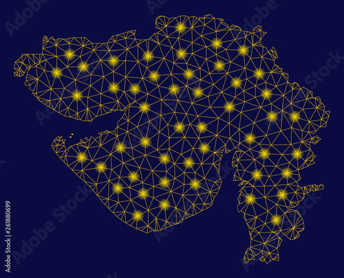 Bright yellow mesh Gujarat State map with glow effect. Wire frame triangular mesh in vector EPS10 format on a dark black background. Abstract 2d mesh created from triangular lines, spheric points,