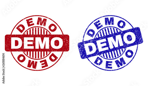 Grunge DEMO round stamp seals isolated on a white background. Round seals with grunge texture in red and blue colors. Vector rubber imprint of DEMO title inside circle form with stripes.