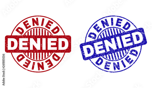 Grunge DENIED round stamp seals isolated on a white background. Round seals with grunge texture in red and blue colors. Vector rubber imprint of DENIED text inside circle form with stripes.