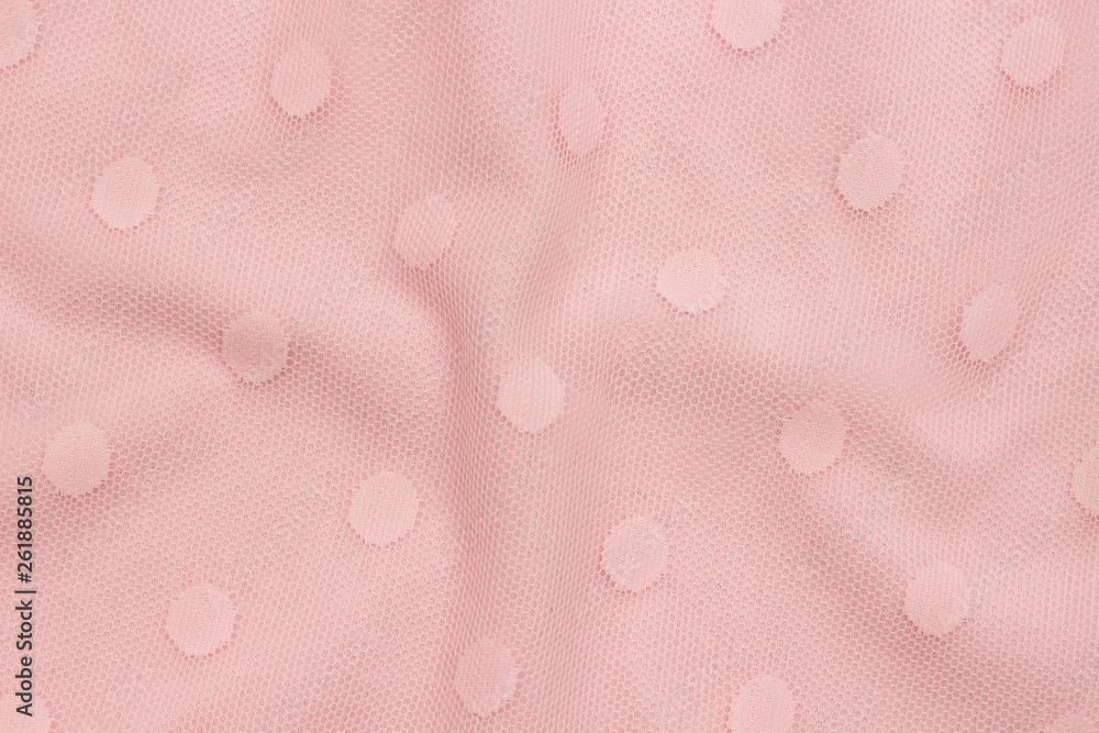 Pink decorative fabric mesh with patterns of circles as background or texture. Sample material. Pink decorative fabric mesh with patterns of circles as background or texture. Sample material.