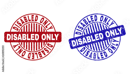 Grunge DISABLED ONLY round stamp seals isolated on a white background. Round seals with distress texture in red and blue colors.