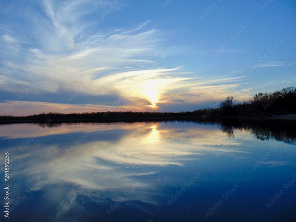 reflection of sunset on lake reflection of sunset on lake