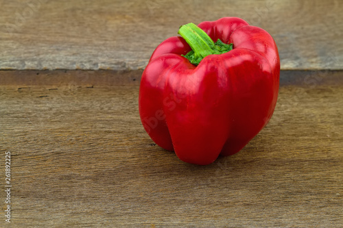 still – life concept colorful of fresh sweet bell pepper (capsicum) on wooden background