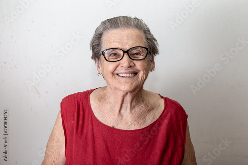 Beautiful older woman laughing and smiling. Smiling elderly woman. photo