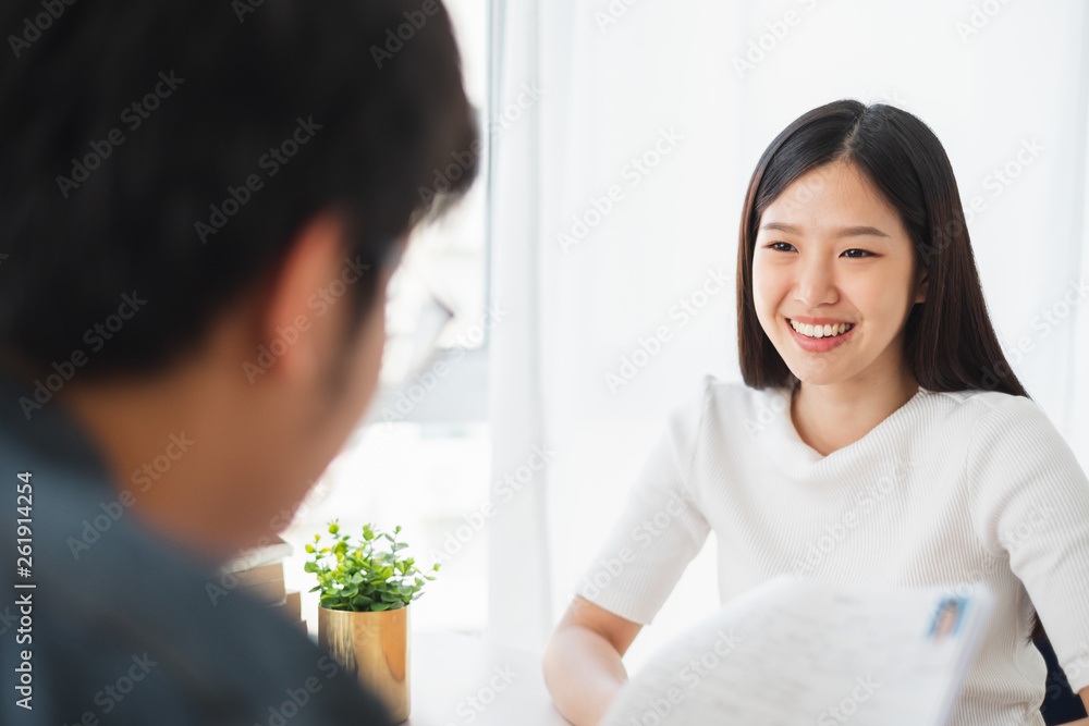 Asian business woman discussing/job interview with colleauge/boss for business meeting Asian business woman discussing/job interview with colleauge/boss for business meeting
