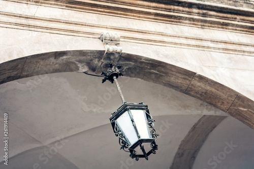 Old street lamppost – vintage light on streets in Catania, Sicily, Italy.