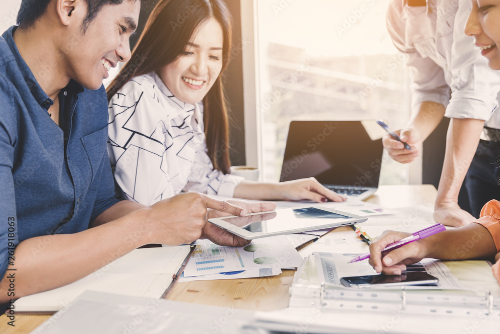 Obraz premium Business meeting concept; Business people and staff meeting in office to briefing strategy information of corporate; Strategy Department in corporate brainstorming at meeting room