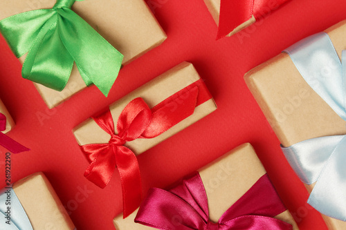 Gifts packed with craft paper and colorful satin ribbons