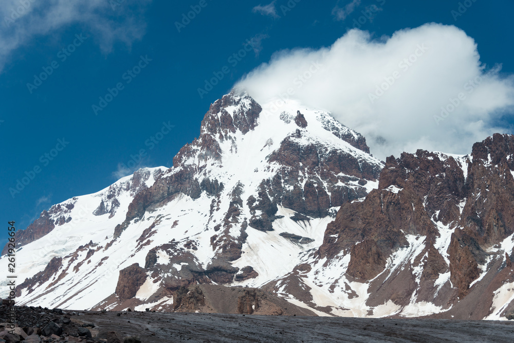 Kazbegi, Georgia - Jun 29 2018: Mount Kazbek (5047m). a famous landscape in Kazbegi, Mtskheta-Mtianeti, Georgia.