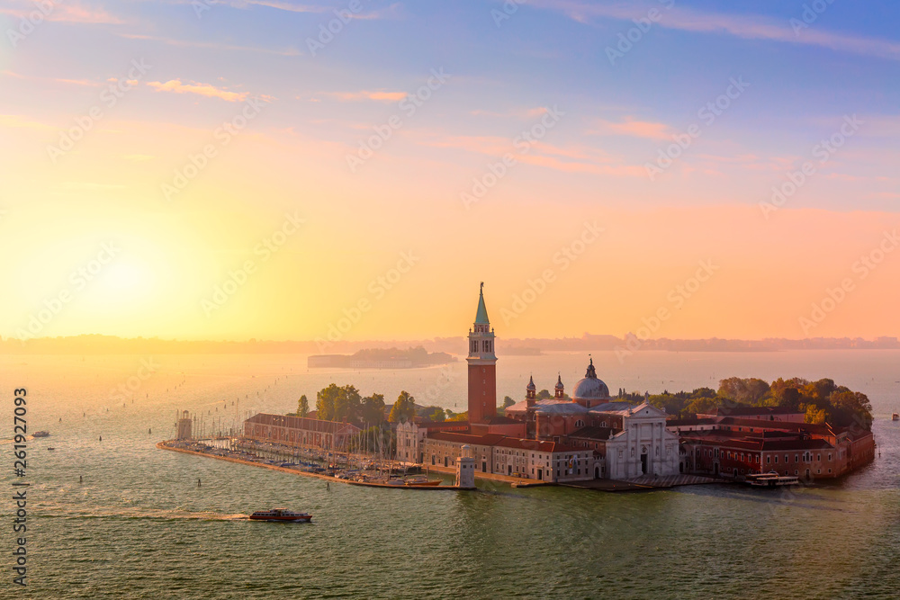 Aerial view of San Giorgio di Maggiore island in Venice at beautiful sunrise. Summer day. Aerial view of San Giorgio di Maggiore island in Venice at beautiful sunrise. Summer day.