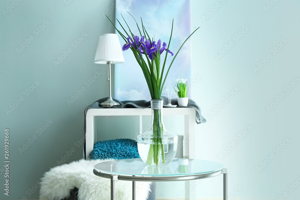 Vase with beautiful flowers on table in room Vase with beautiful flowers on table in room
