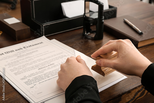 Female notary public workin...