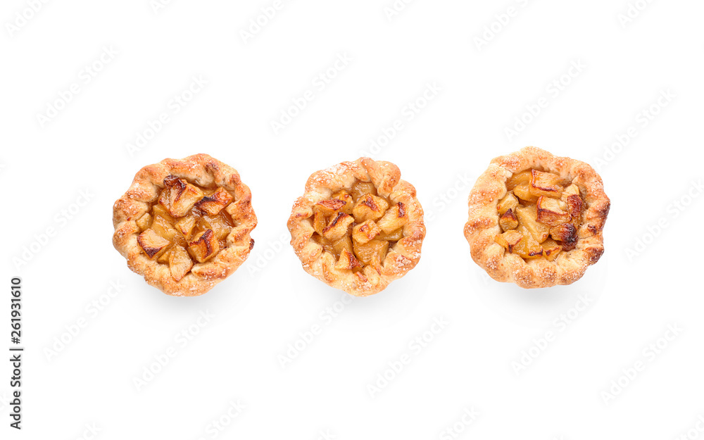 Tasty apple pies on white background