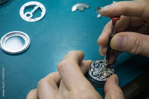 Repairing the mechanical watches. parts of automatic wristwatch.