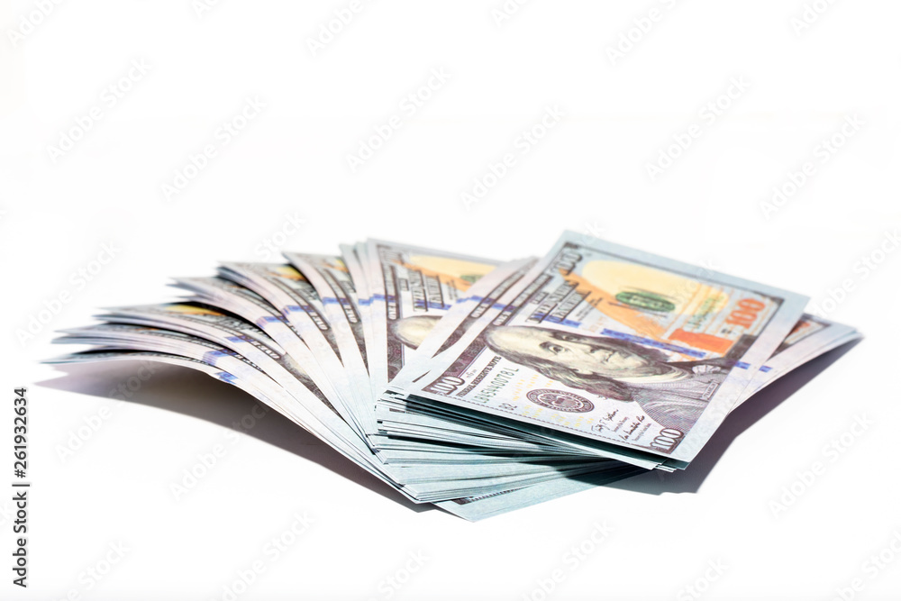 Money comes near American dollar, cash One hundred dollar banknotes Money comes near American dollar, cash One hundred dollar banknotes